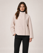 Women’s pink funnel neck coat front view