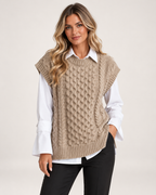 Women’s Knitted Vest with Longline Shape and Cable Detail in Beige, lower body product focus view