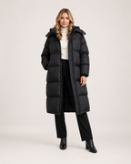 Women’s Long Puffer Coat with Hood and Oversized Fit in Black, full body view