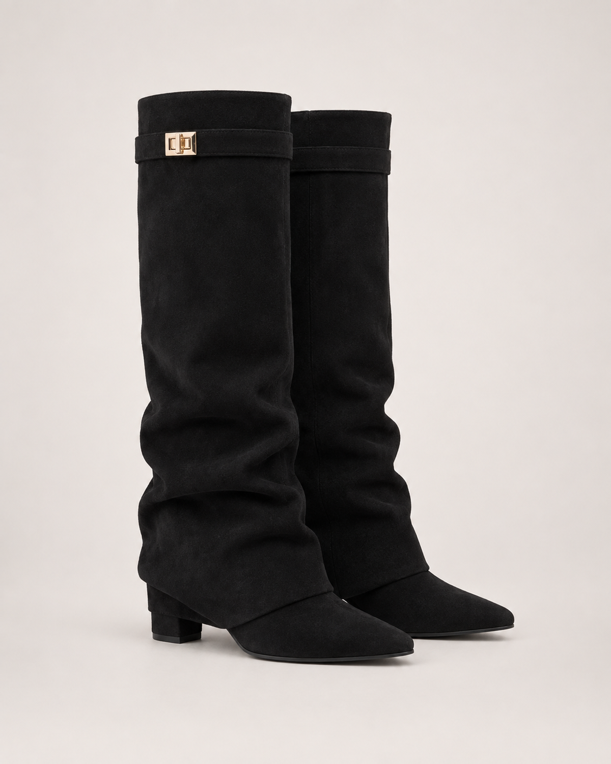 Women’s Knee High Boots with Pointed Toe and Metal Buckle in Black, product only pair front three quarter view