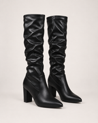 Women’s Knee High Boots with Pointed Toe and High Heel in Black, product only pair front three quarter view