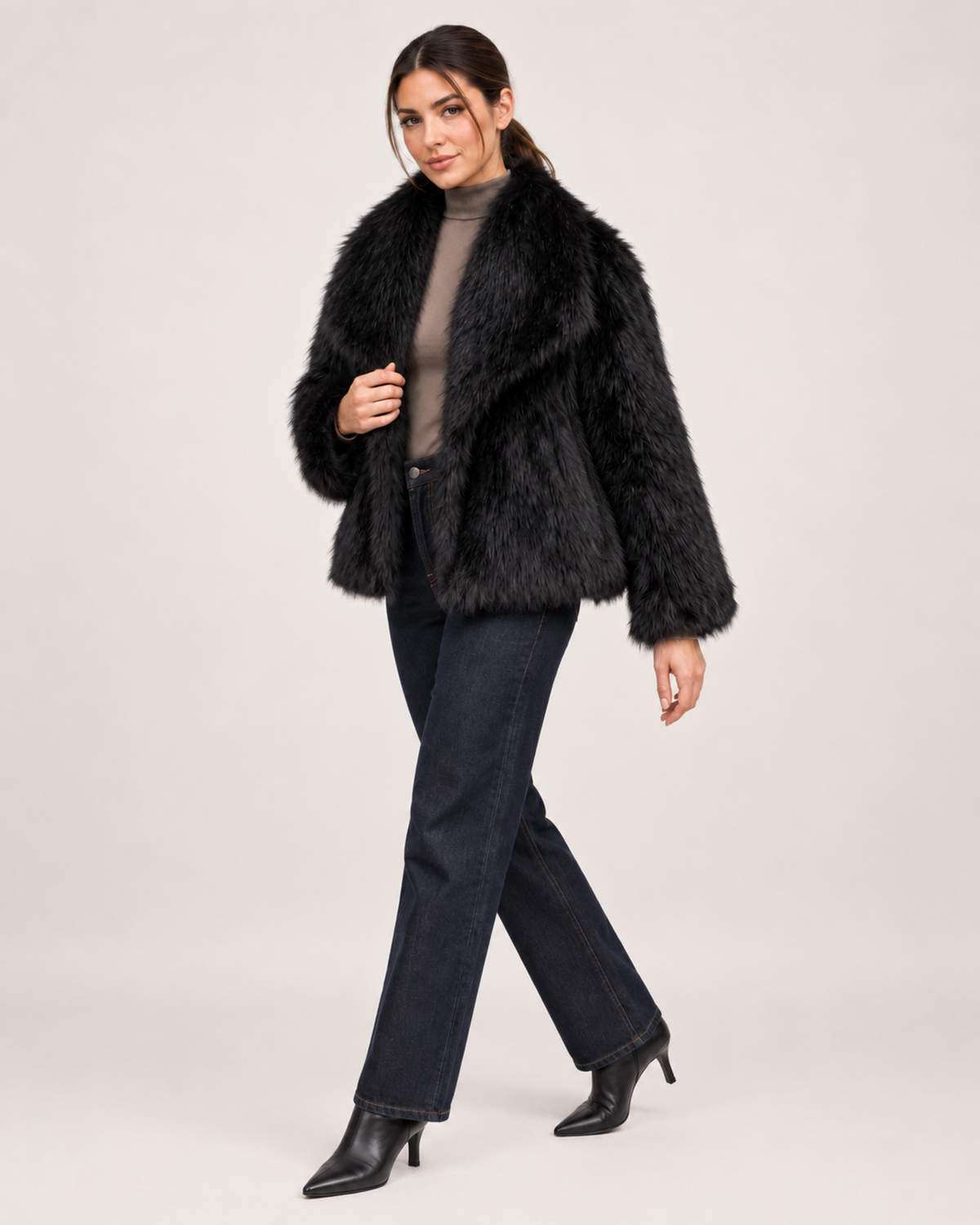 Women’s black faux fur jacket full body walking view