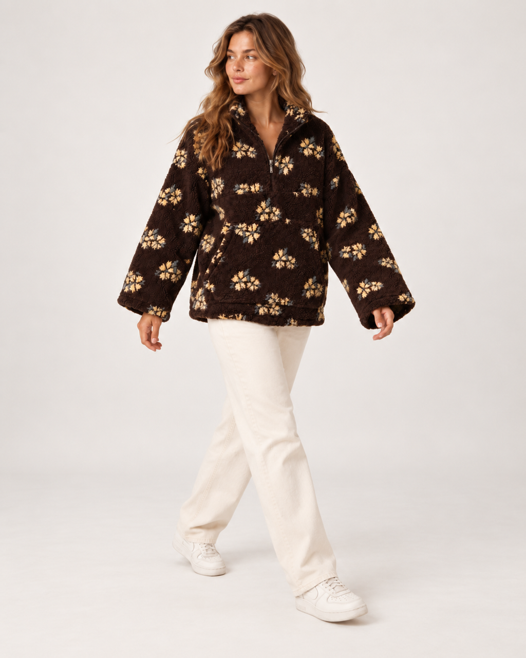 Women’s borg jacket with floral pattern and half zip walking full body view