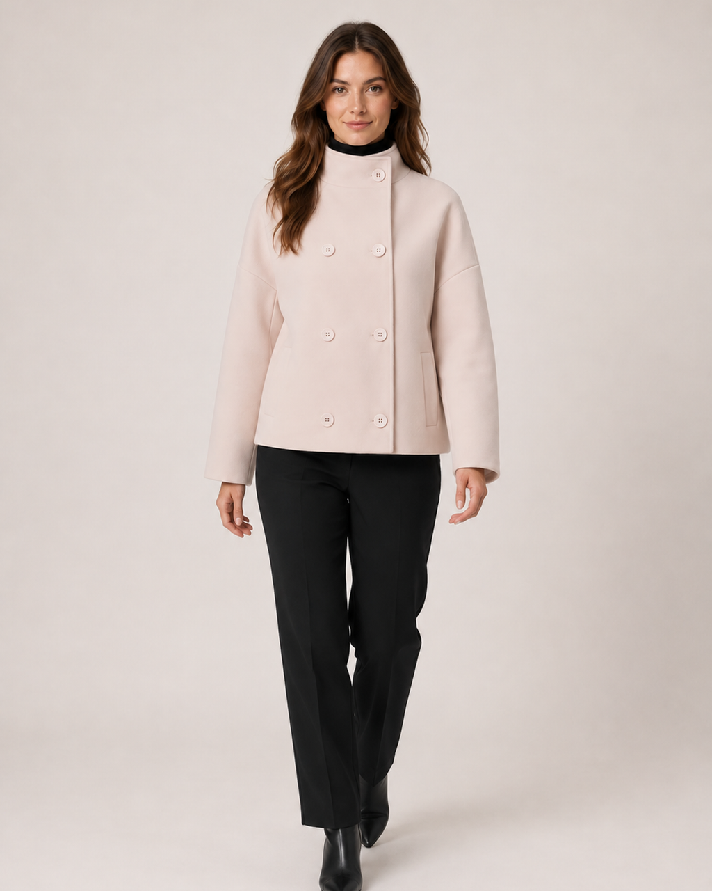 Women’s pink funnel neck coat full body walking view
