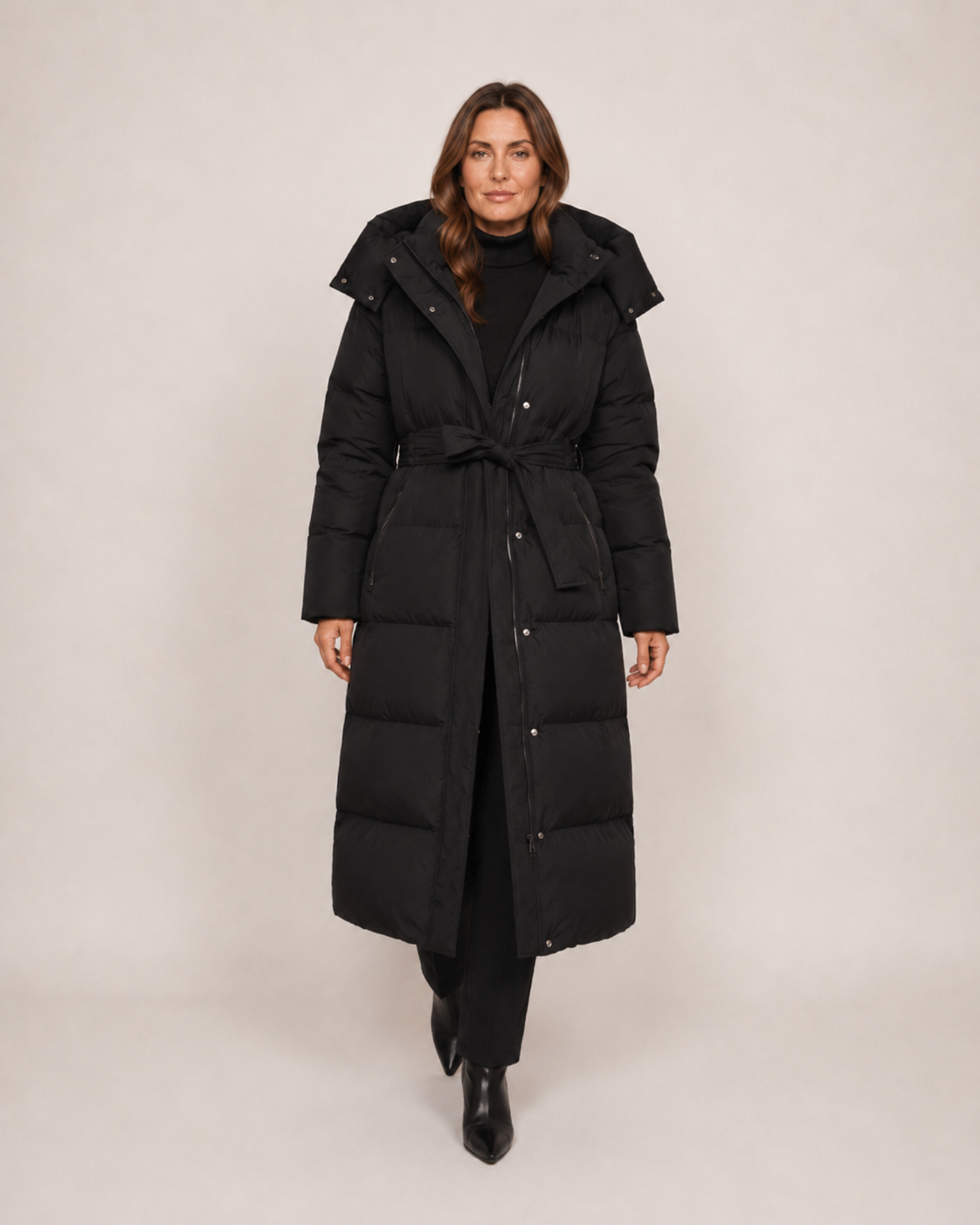 Women’s Long Puffer Coat with Hood and Belt in Black, full body view