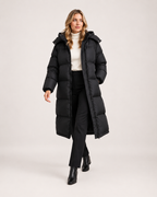 Women’s Long Puffer Coat with Hood and Oversized Fit in Black, full body view