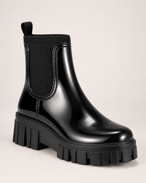 Women's black gloss Chelsea Wellington boot side three-quarter view