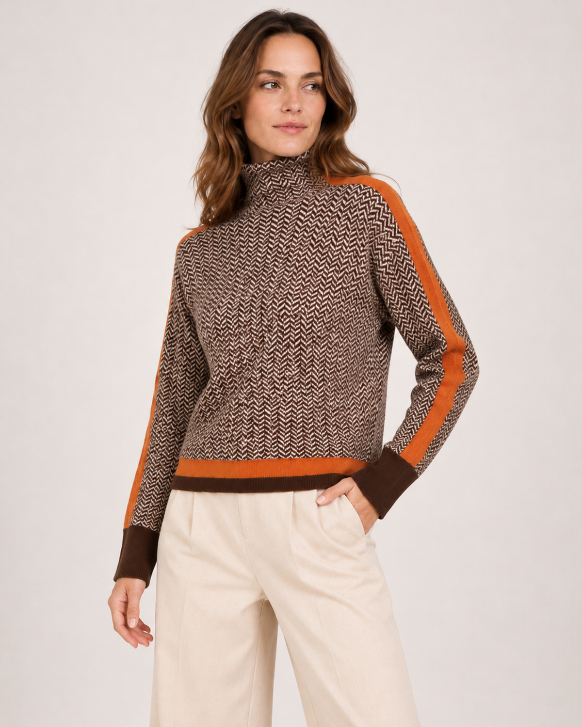 Women's orange contrast sleeve roll neck jumper three quarter view