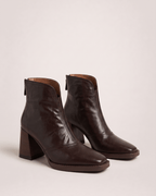 Dark Brown women’s boots in a front three-quarter pair view