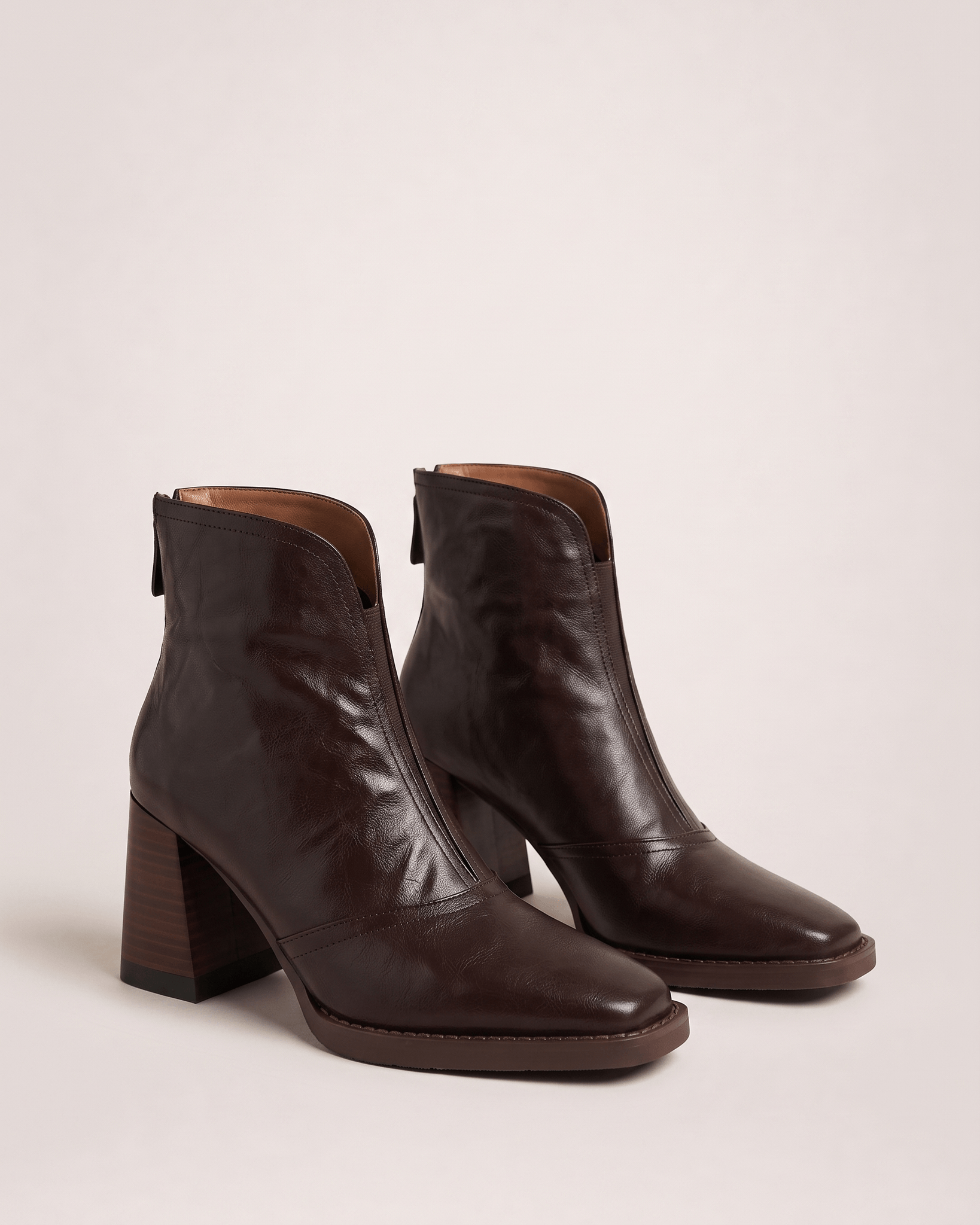 Dark Brown women’s boots in a front three-quarter pair view