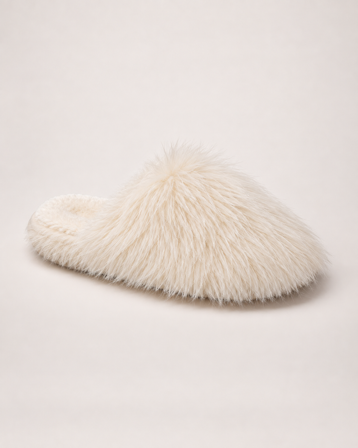 Women’s Mule Slippers with Fluffy Closed Toe in Cream, single boot outer three quarter view