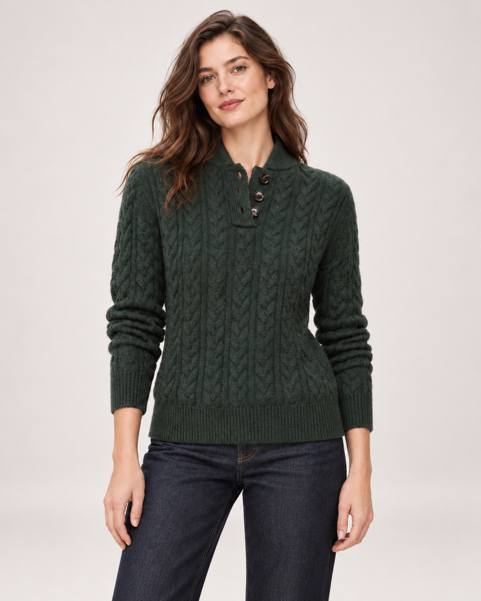 Women’s green cable knit jumper front styling view