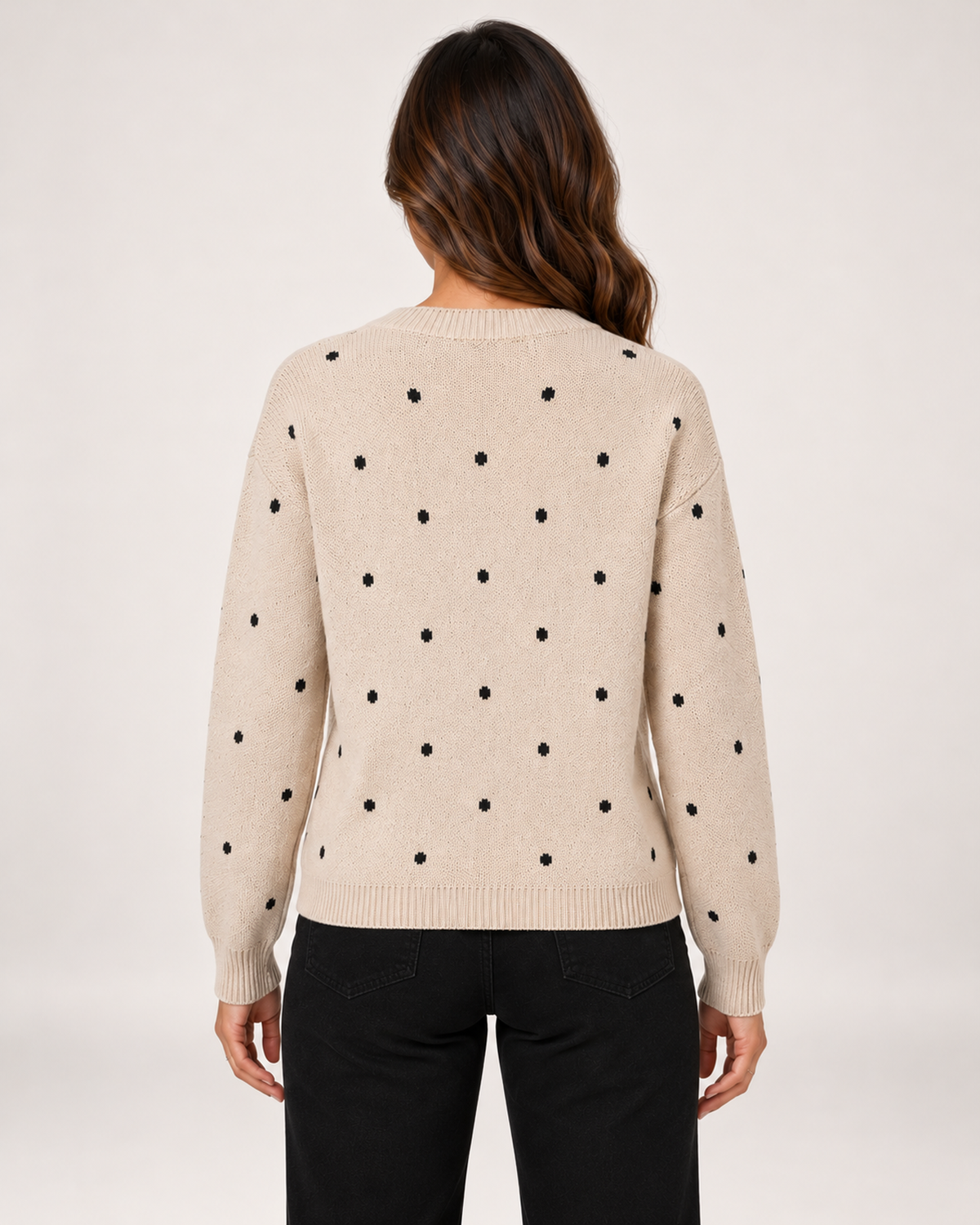 Women's beige polka dot sweater back view