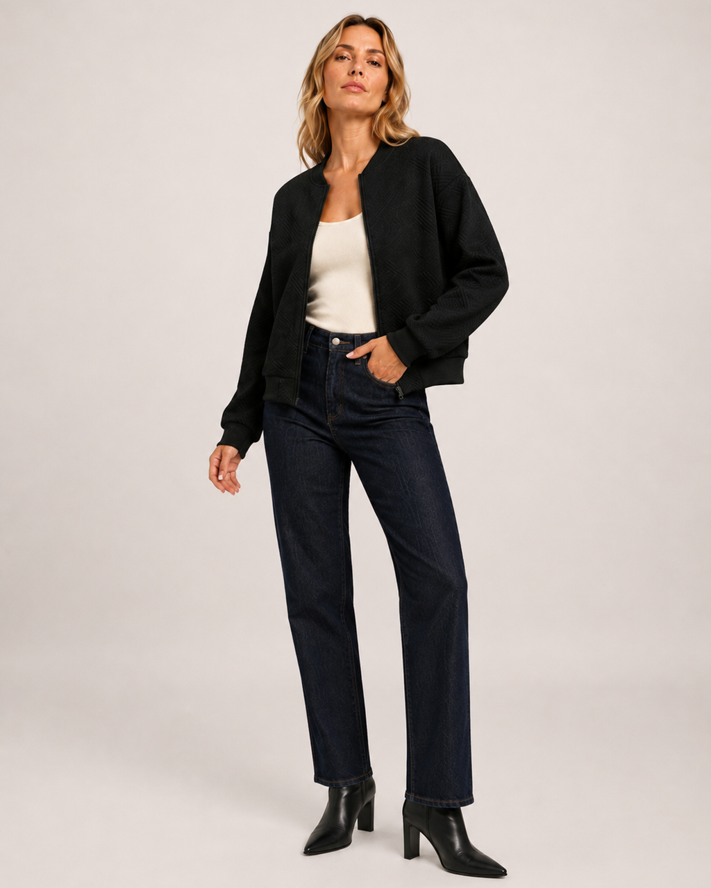 Women’s black zip up cardigan dynamic three quarter view