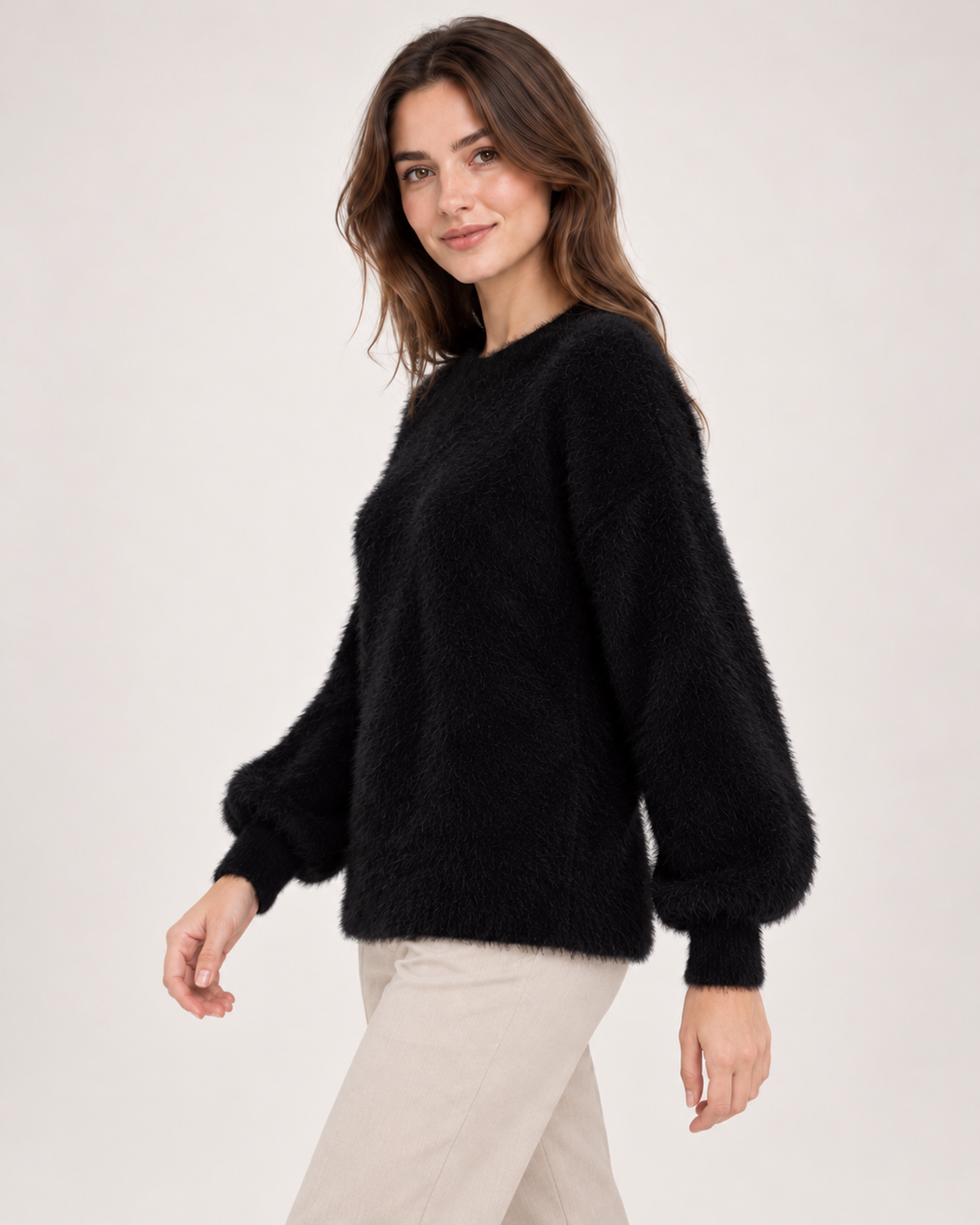 Women's black fluffy crew neck jumper side view