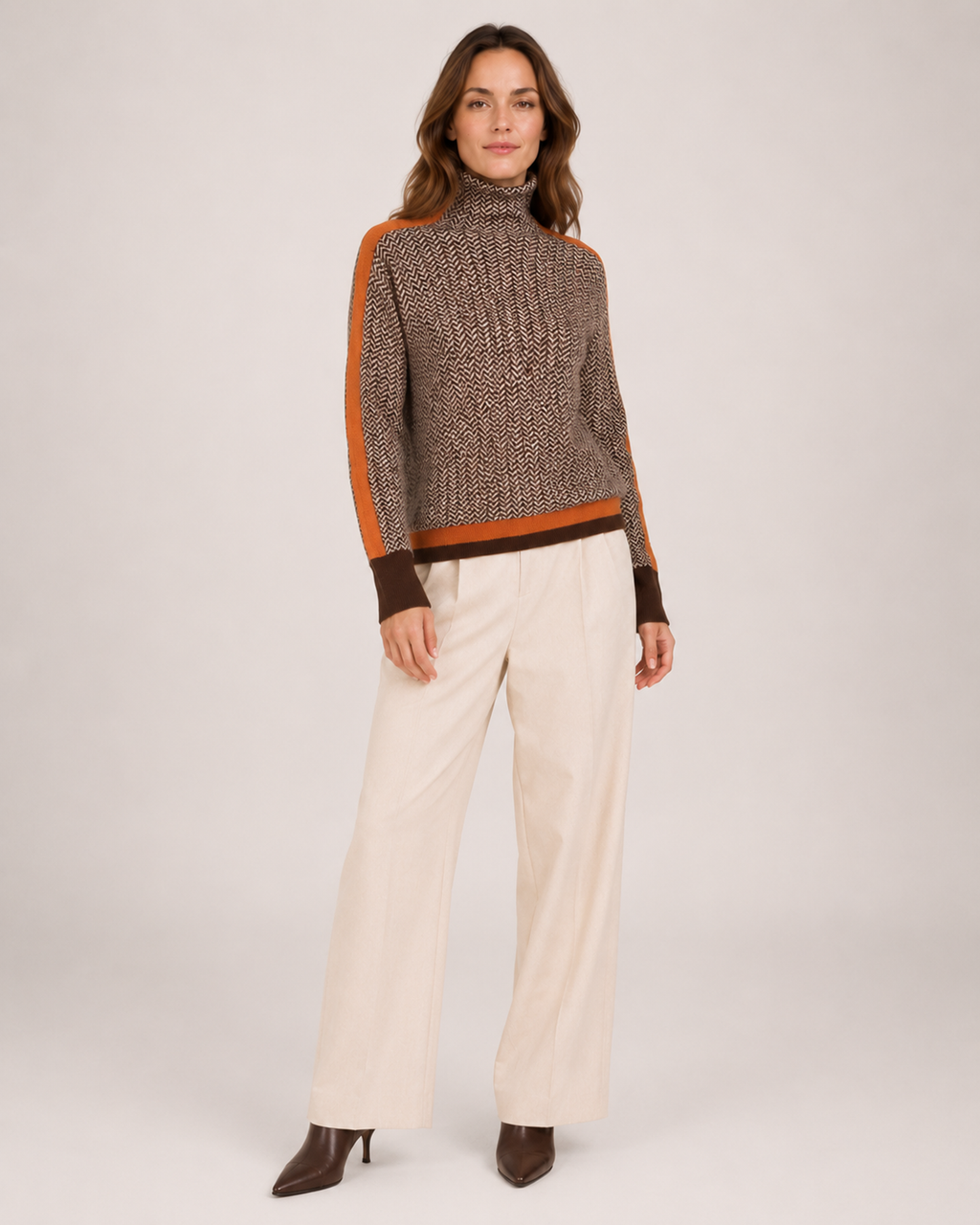 Women’s Roll Neck Jumper with Contrast Sleeves in Orange, three quarter body view