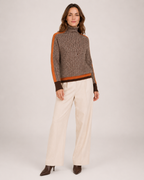 Women’s Roll Neck Jumper with Contrast Sleeves in Orange, three quarter body view