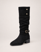 Women’s Knee High Boots with Slouch Shaft and Block Heel in Black, single boot complementary angle view