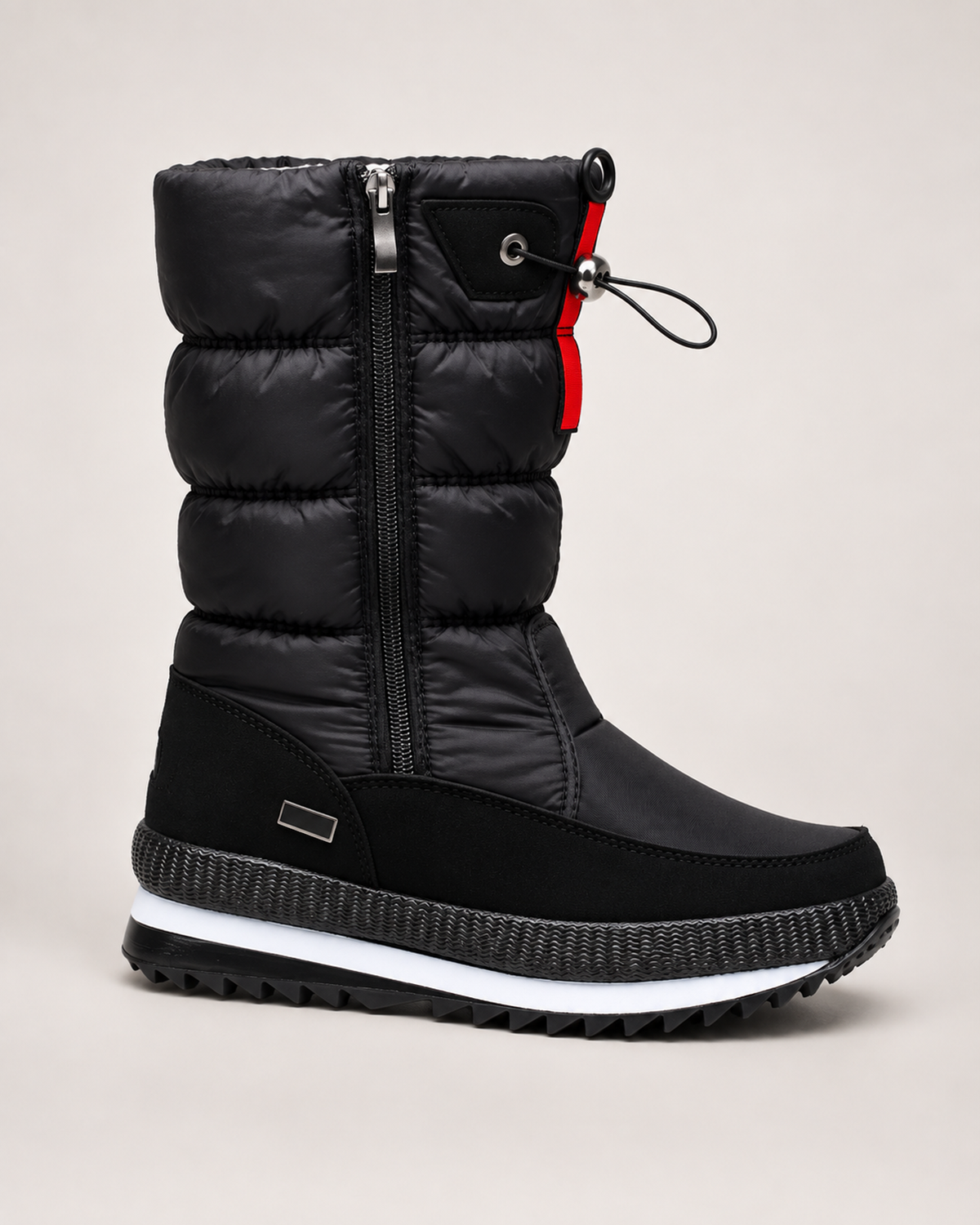 Women’s Snow Boots with Quilted Shaft and Treaded Sole in Black, single boot complementary angle view