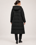 Women’s black long puffer coat full back view