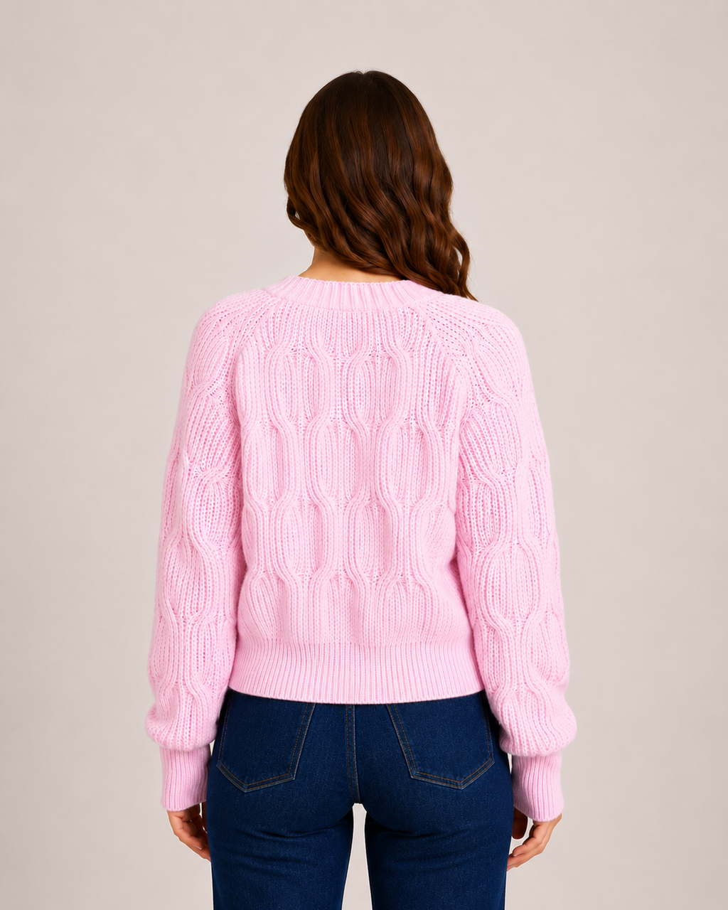 Women’s pink bow cardigan back view