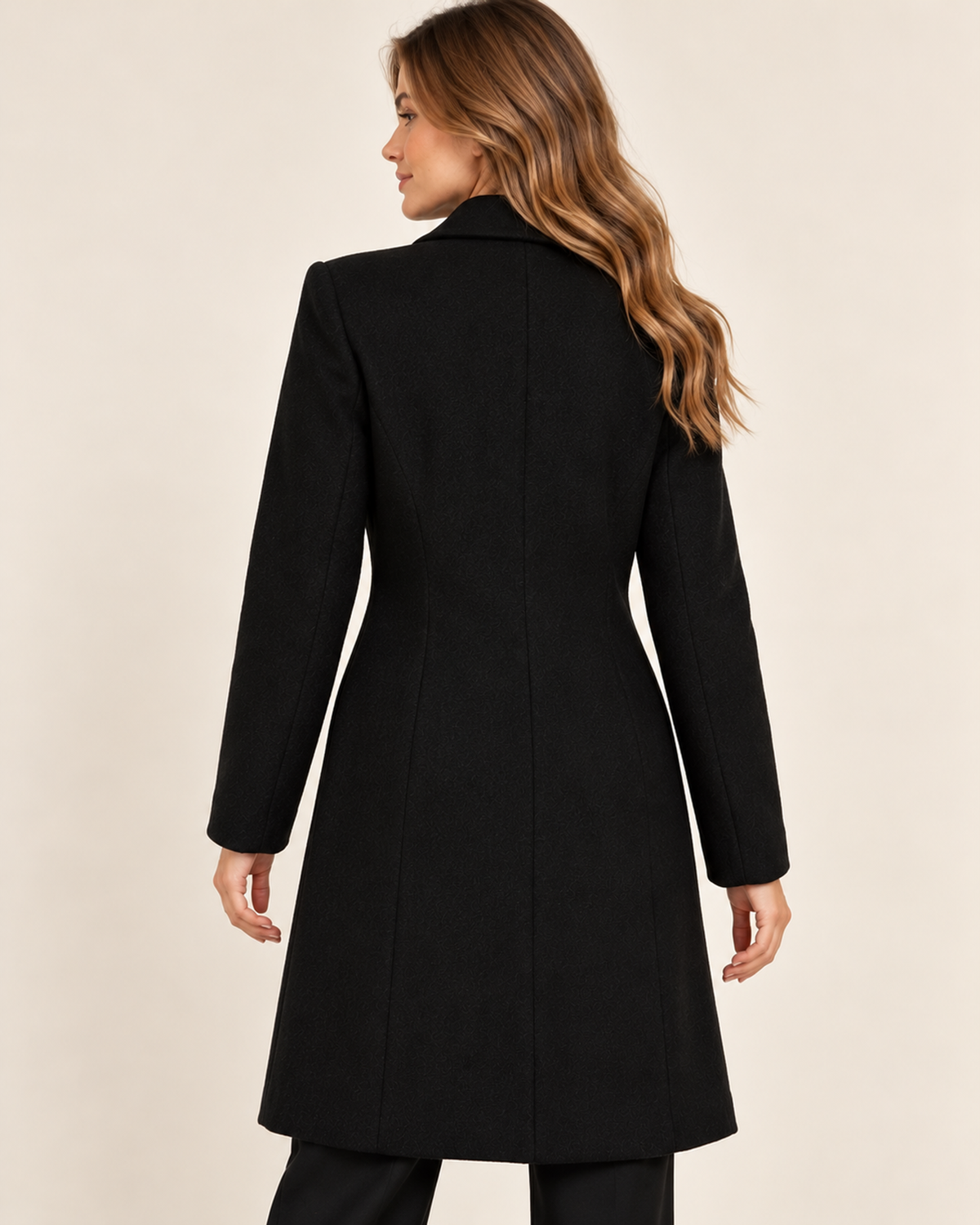 Women's black double breasted lapel coat back view