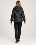 Women’s Quilted Jacket with Hood and Zip Front in Black, lower body product focus view