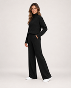 Women’s Knitted Co-Ord Set with Roll Neck and Wide Leg Trousers in Black, three quarter body view