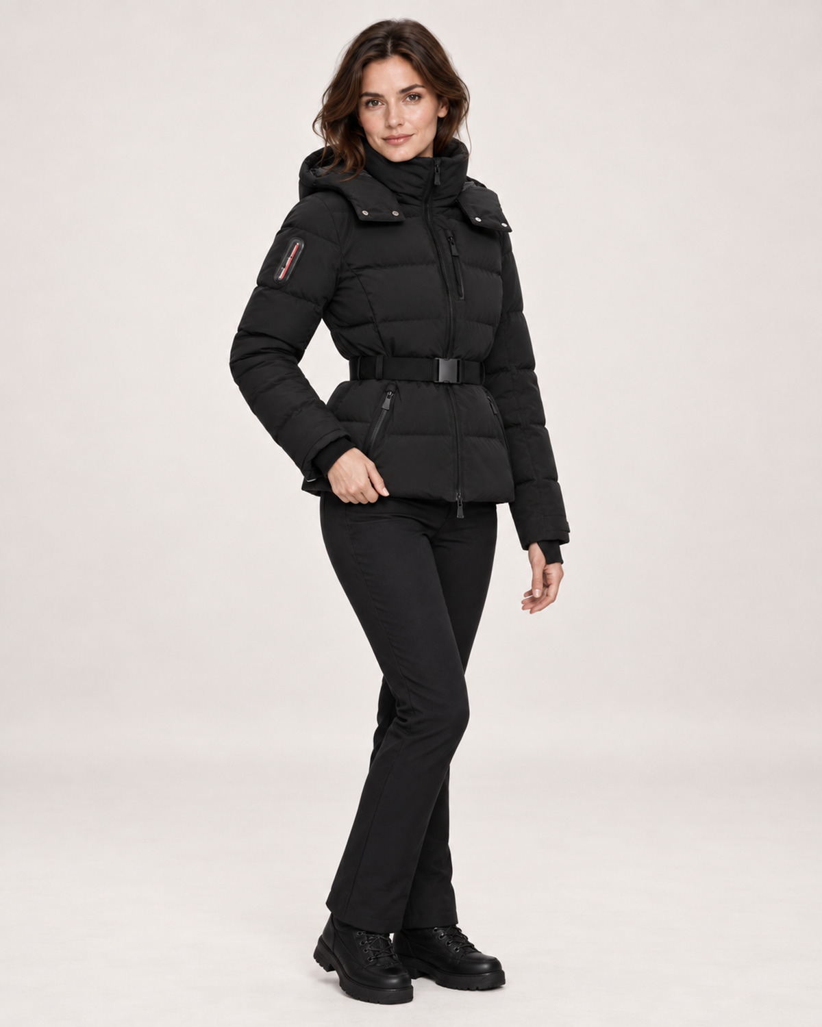 Women’s Ski Jacket in Black with Belt and Hood in Black, three quarter body view