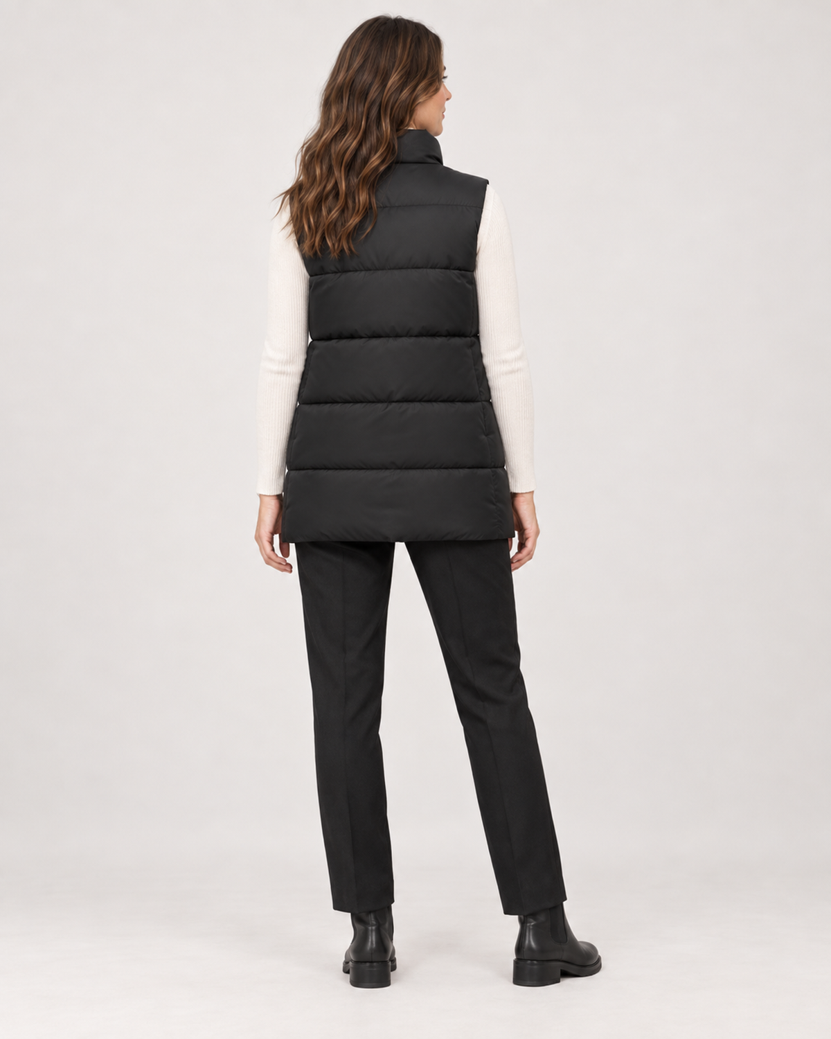 Women’s Puffer Gilet with Longline Shape and Stand Collar in Black, three quarter body view