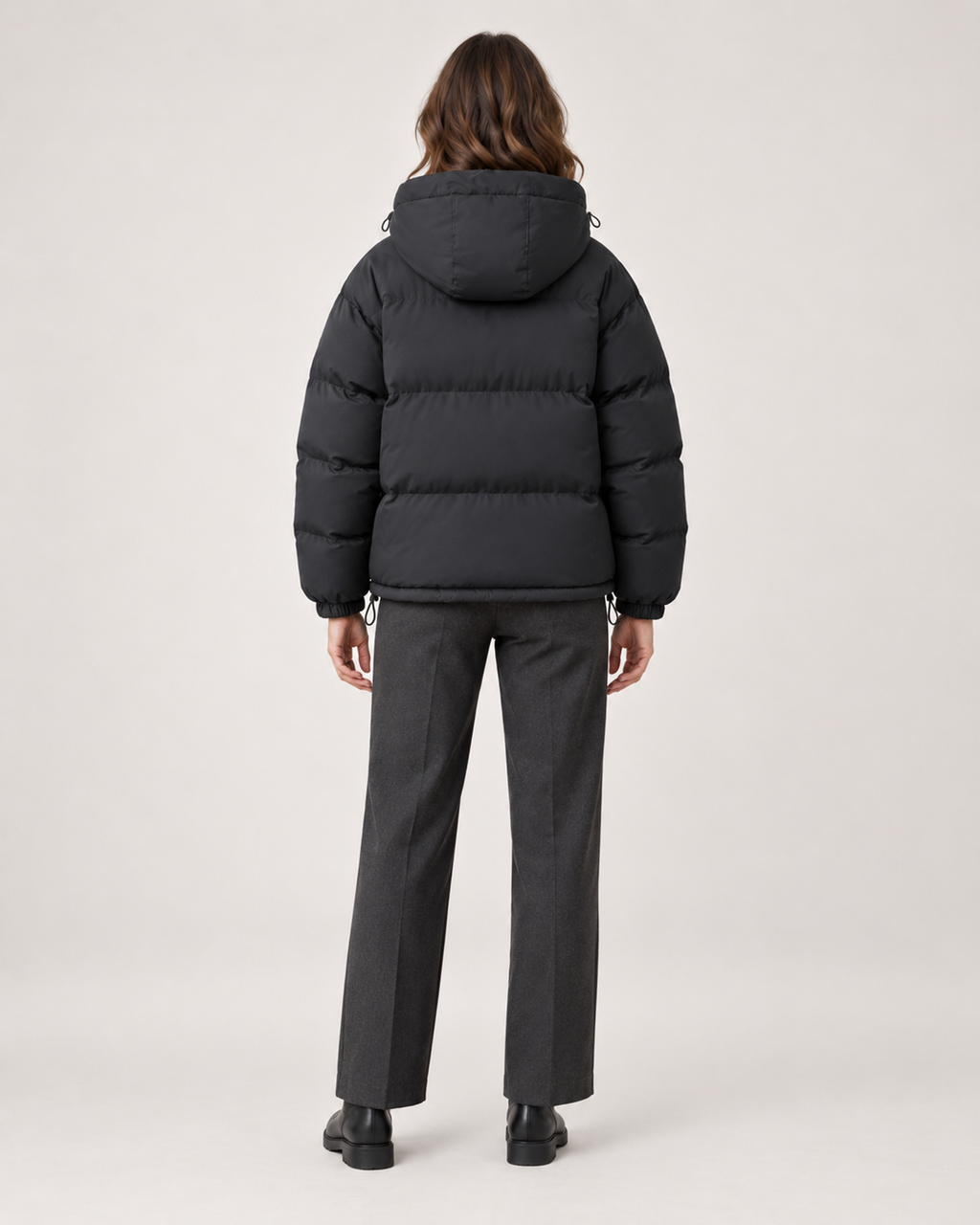 Women’s Puffer Jacket with Hood and Drawcord Hem in Black, three quarter body view