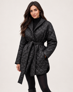 Women’s Quilted Coat with Belt and Lapel Collar in Black, three quarter body view