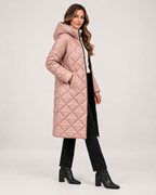 Women’s Long Puffer Jacket with Hood and Diamond Quilting in Dusty Pink, three quarter body view