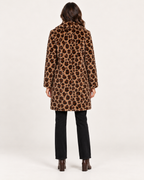 Women’s Faux Fur Coat with Leopard Print and Lapel Collar in Leopard Print, three quarter body view