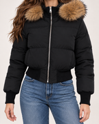 Women's black cropped puffer jacket hood trim and zip detail