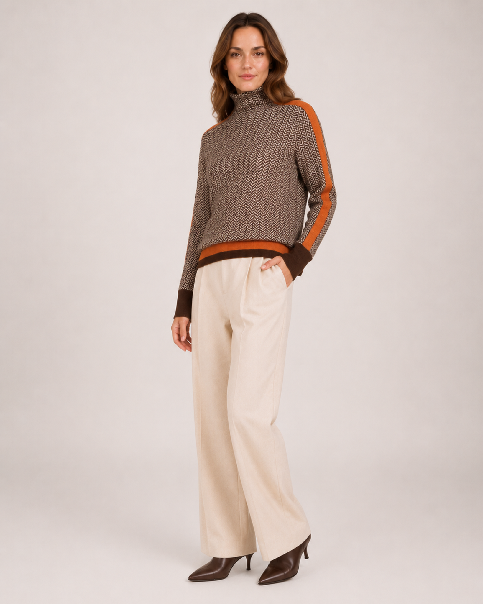 Women’s Roll Neck Jumper with Contrast Sleeves in Orange, three quarter body view