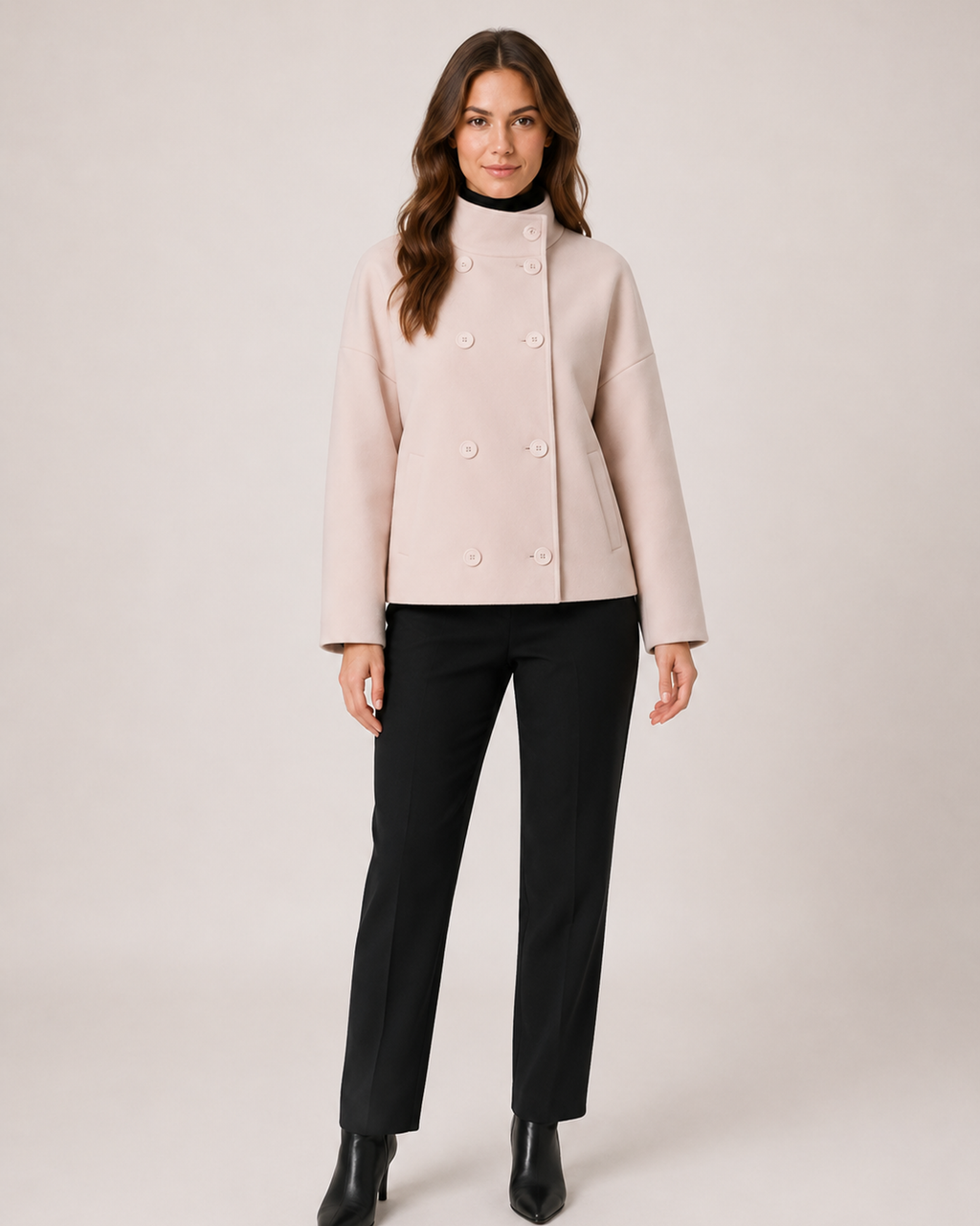 Women’s pink funnel neck coat full body standing view