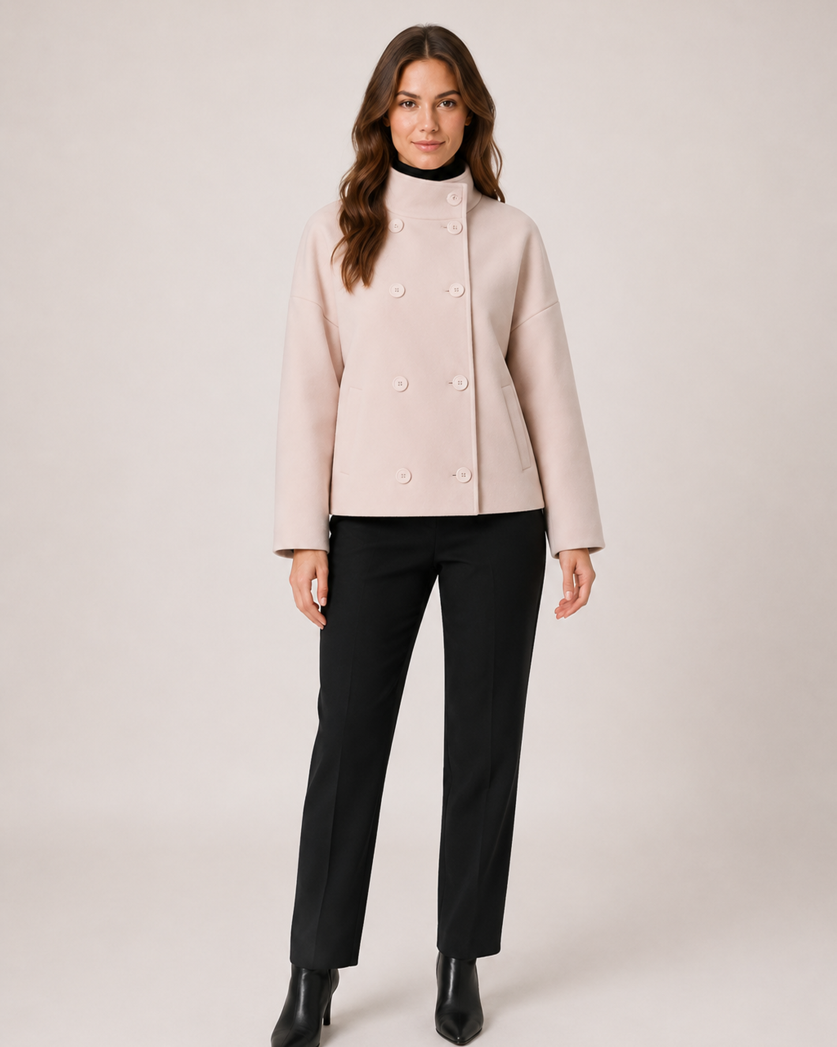 Women’s pink funnel neck coat full body standing view