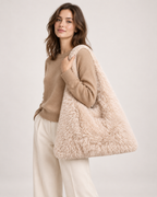 Women’s Fluffy Tote Bag with Wide Shoulder Strap in Beige, upper body product focus view