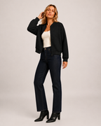 Women’s black zip up cardigan hair sweep fashion view