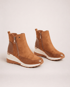 Light brown women’s wedge ankle boots in a decision-helping pair view