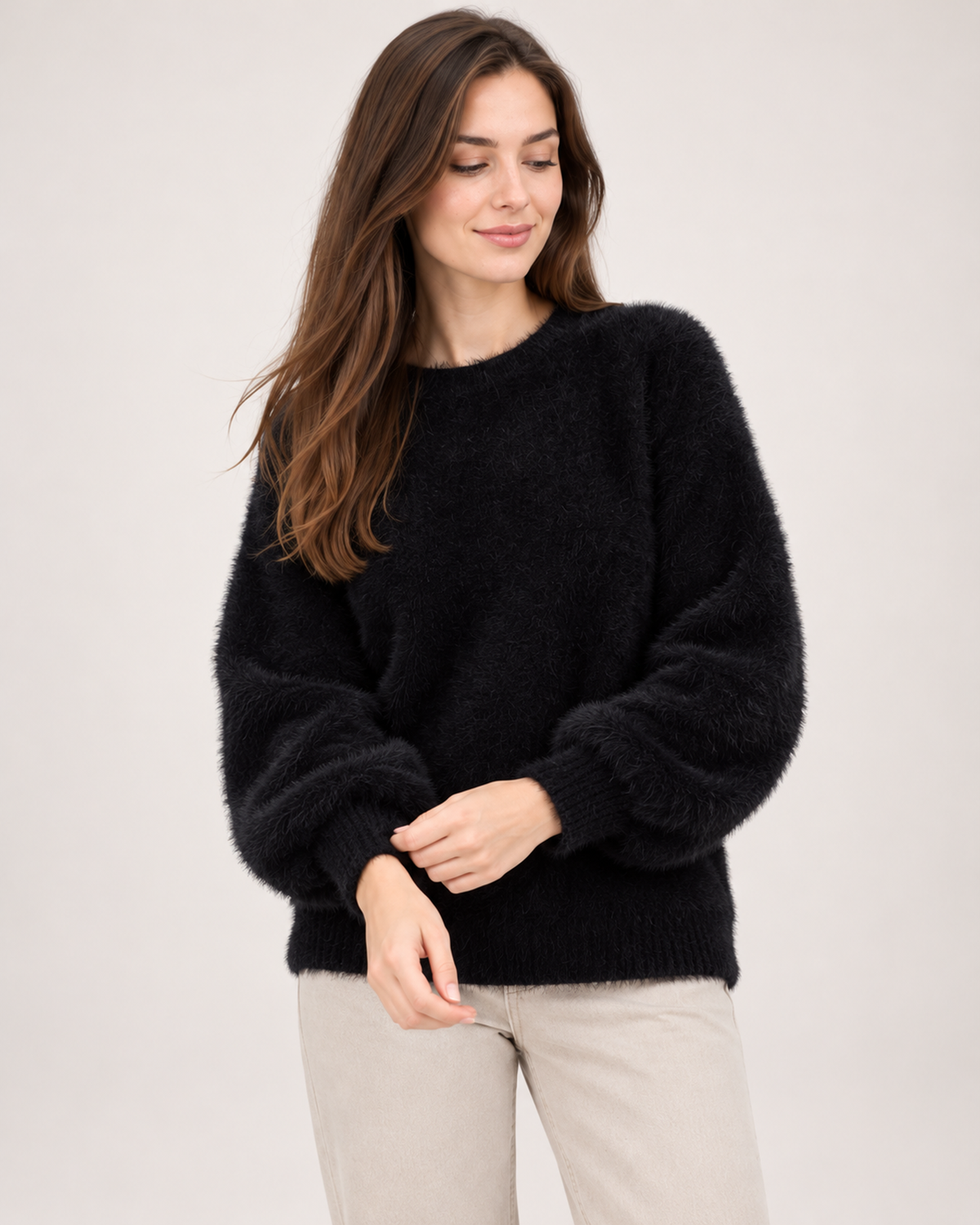 Women's black fluffy crew neck jumper sleeve and texture detail