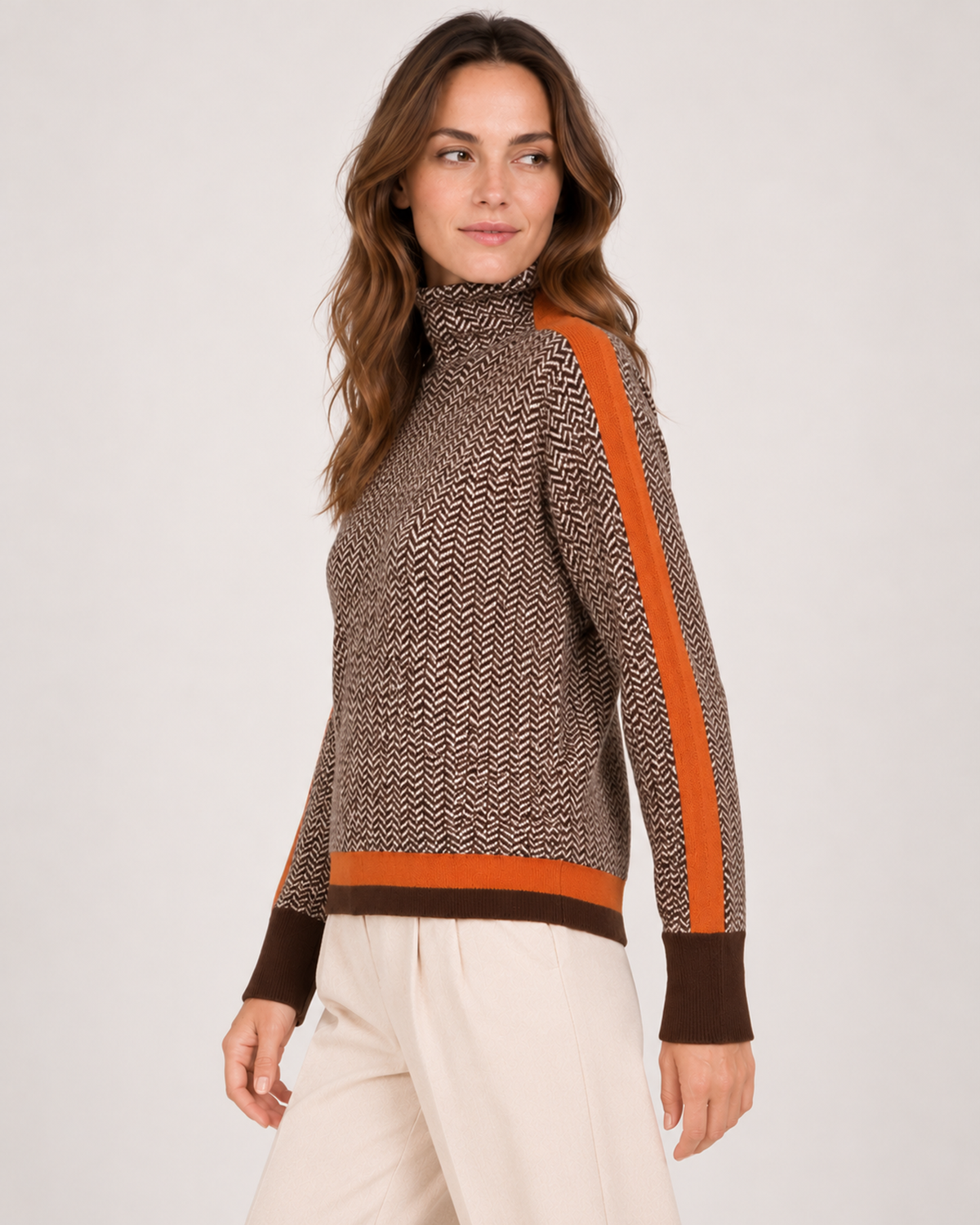 Women's orange contrast sleeve roll neck jumper side view