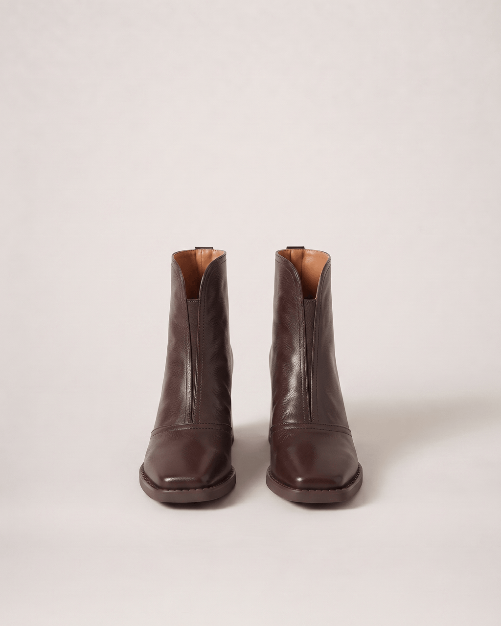 Dark Brown women’s boots in a near-front pair view