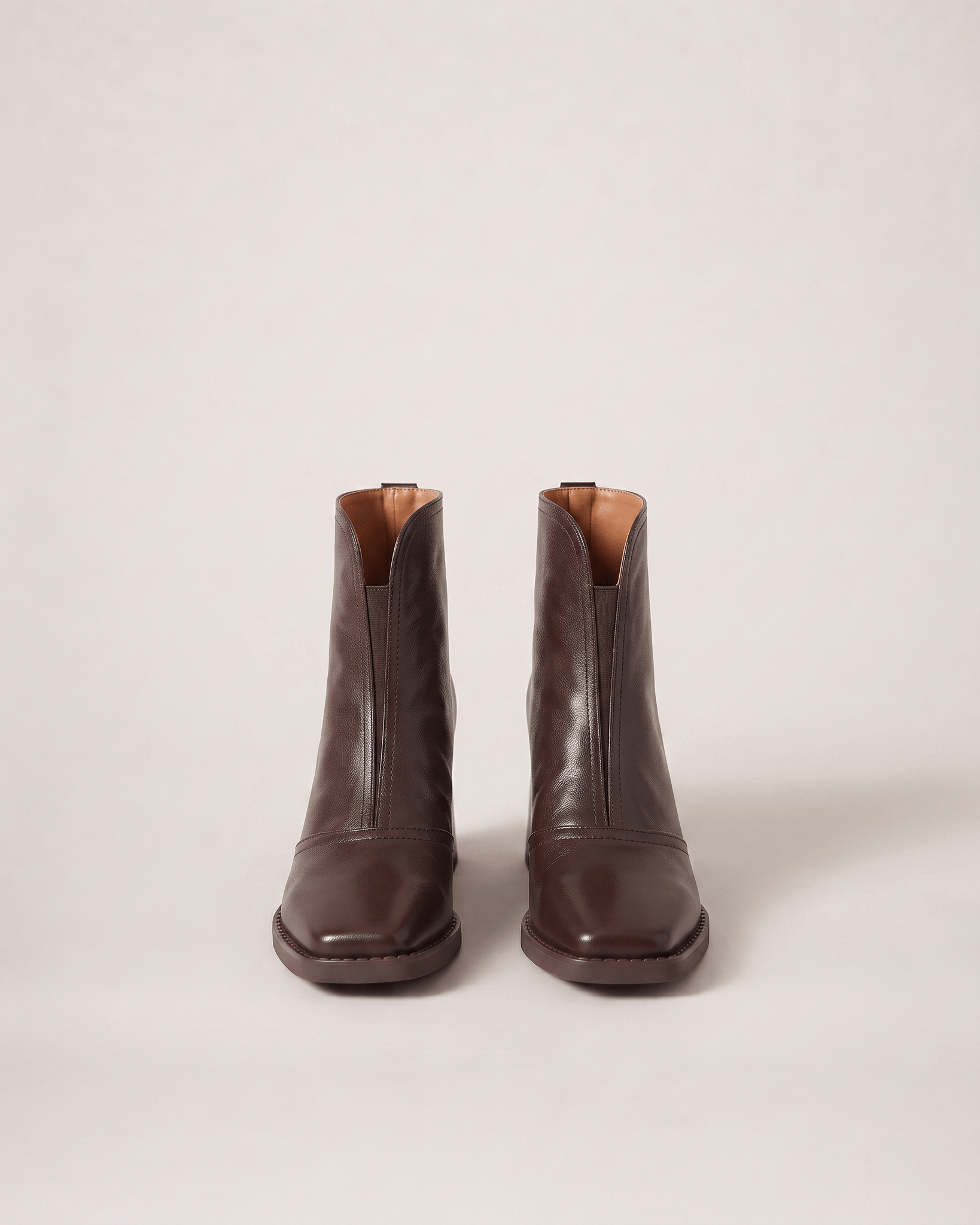 Dark Brown women’s boots in a near-front pair view