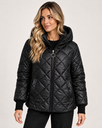 Women’s Quilted Jacket with Hood and Zip Front in Black, lower body product focus view