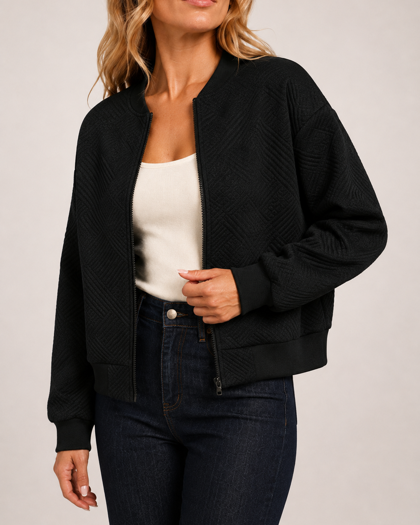 Women’s black zip up cardigan zip and texture detail
