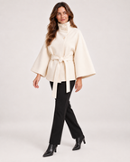 Women’s Cape Coat with Funnel Neck and Belt in Apricot, three quarter body view