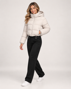 Women’s Puffer Jacket with Hood and Adjustable Hem in Beige, three quarter body view