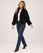 Women’s Fleece Jacket with Funnel Neck and Zip Front in Black, three quarter body view